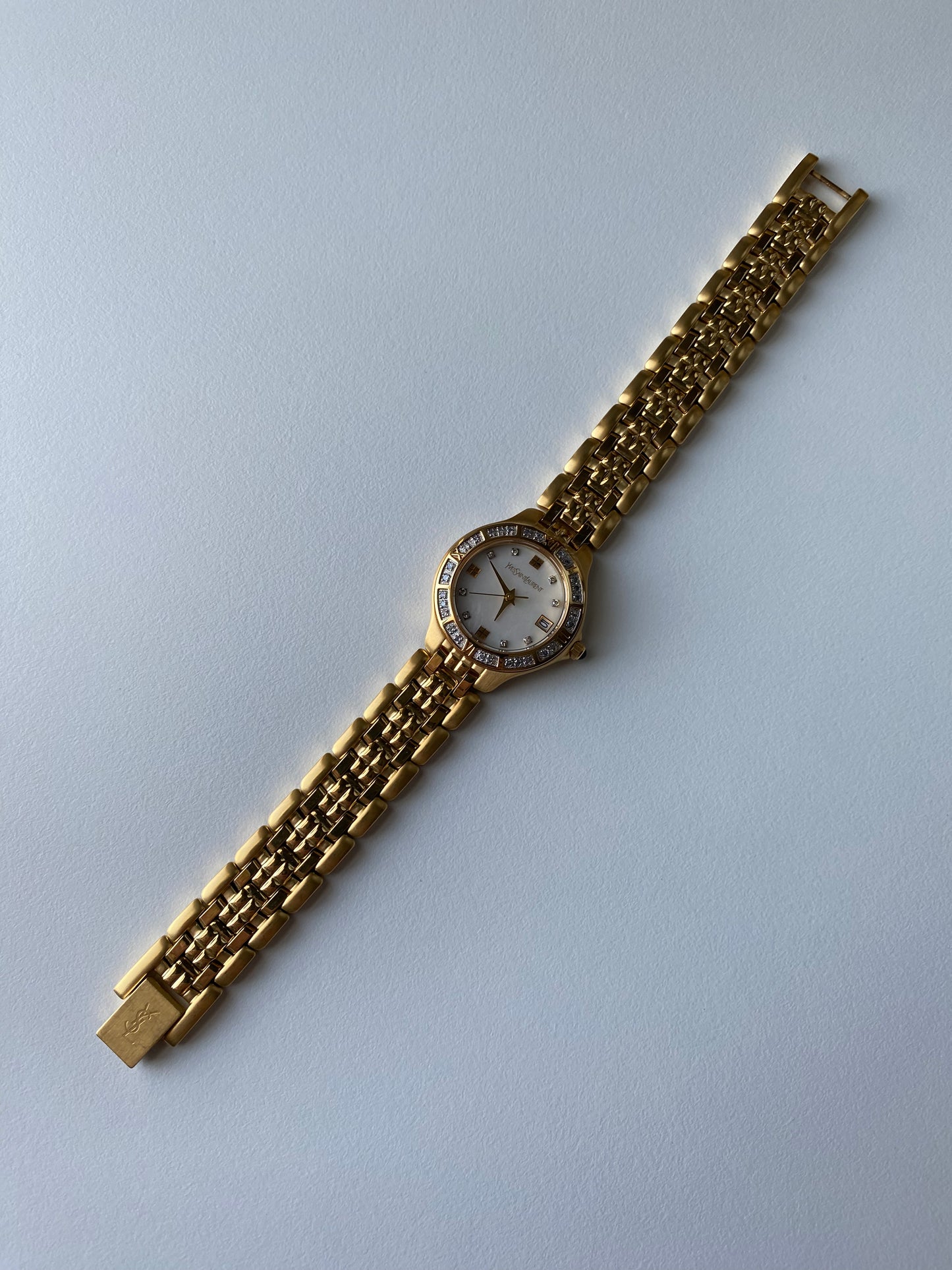 Yves Saint Laurent Gold Tone Diamond Bezel Watch