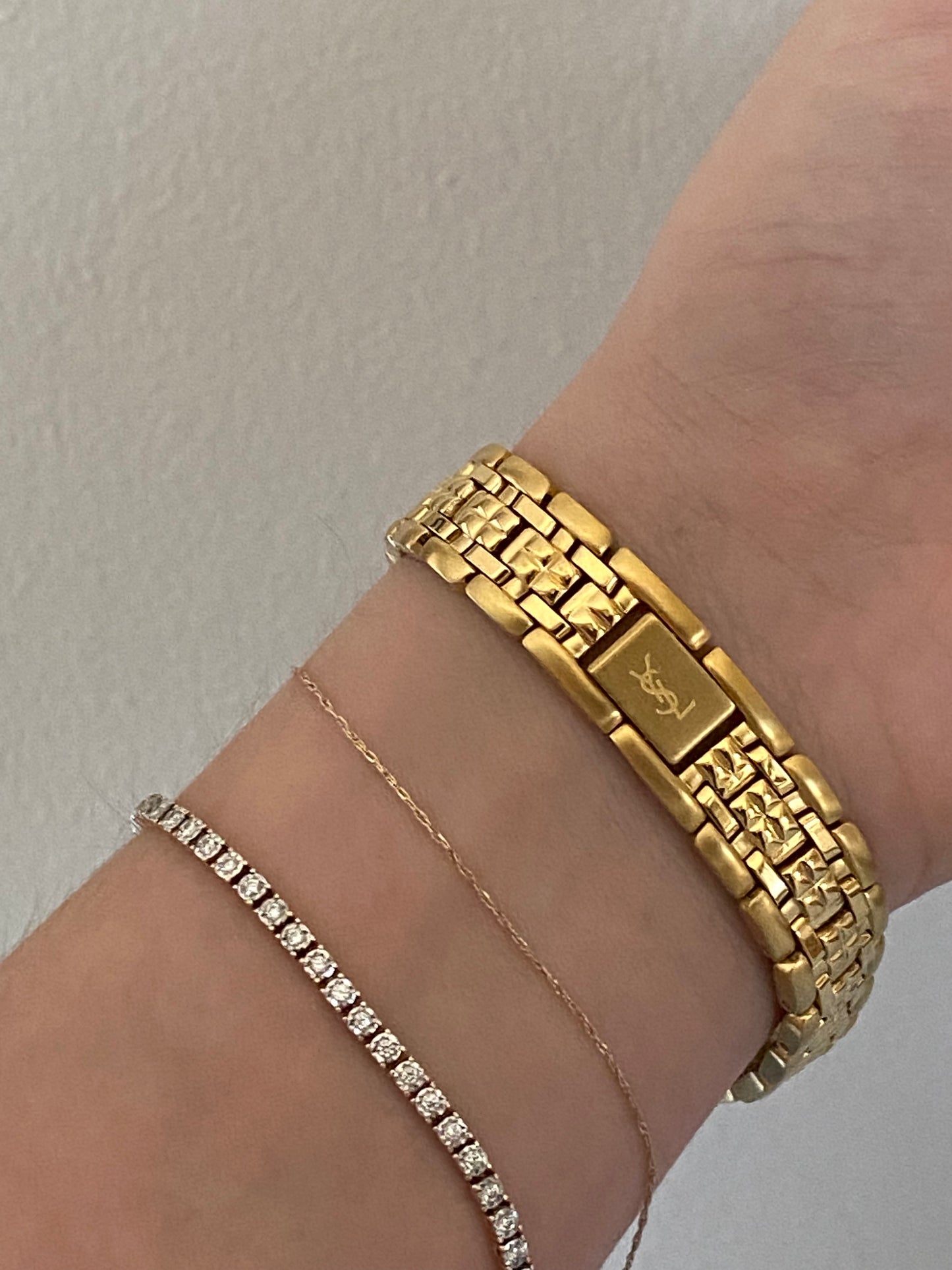 Yves Saint Laurent Gold Tone Diamond Bezel Watch